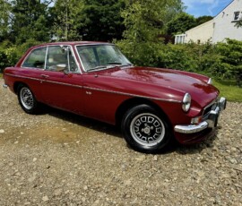 Red classic car worked on by Andy’s Valeting Service